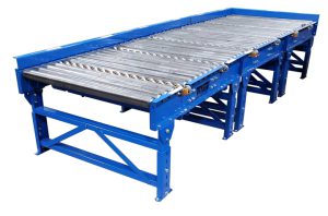 gravity roller conveyor system with skate wheel pop-up for side unloading