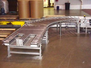 stainless-conveyor-system-with-fork-lift-slots-dairy-operation